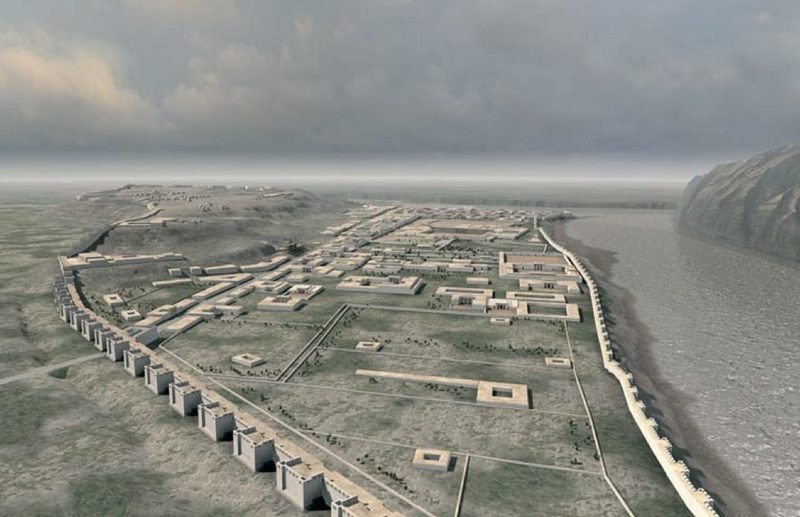 Aï Khanoum: Restored view of the city, with the northern rampart punctuated by massive towers in the foreground and the Darya-i Pandj on the right (3D image by O. Ishisawa, NHK-TAISEI).