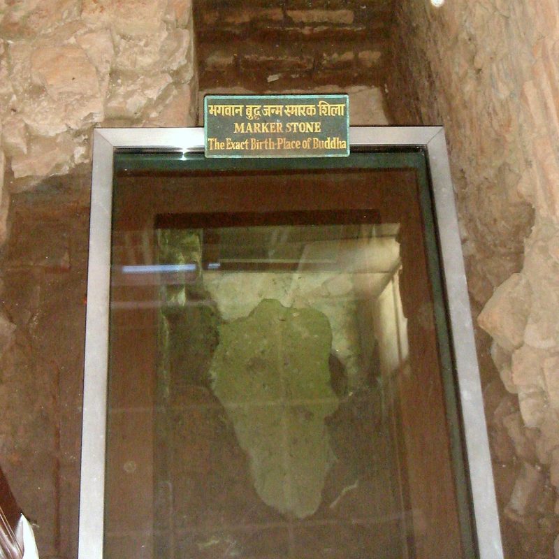 Marker stone, supposedly marking the exact spot of Siddhartha Gautama's birth, Lumbini, Nepal.