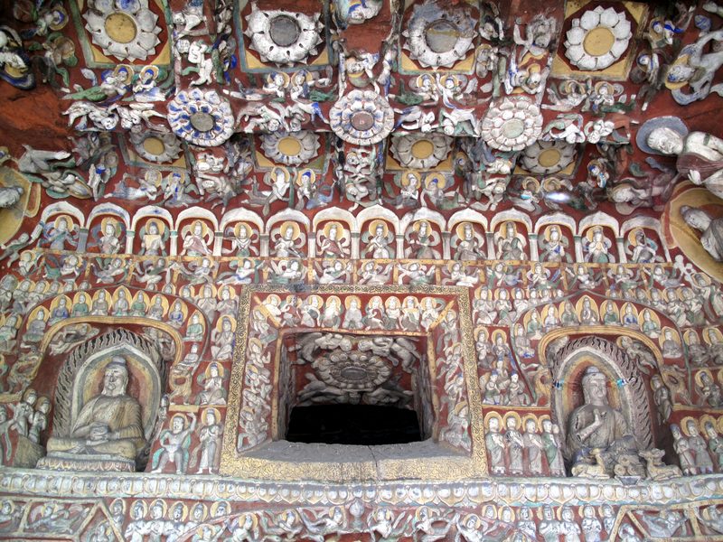Yungang Grottos, Cave 12, decorative stucco reliefs with Buddhas, musicians, and apsarasas.
