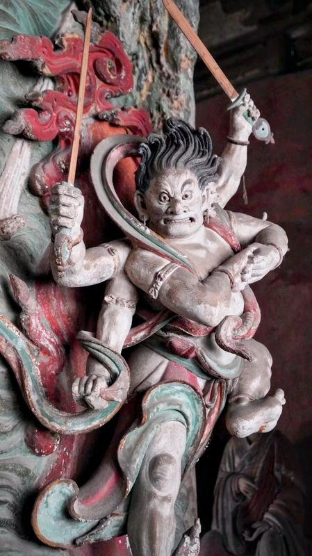 Statue of Kundali (軍荼利明王; Juntuli Mingwang) one out of two Wisdom Kings, or vidyaraja (明王; Mingwang), in Fusheng Temple (福勝寺), Yuncheng, Shanxi, China, Yuan Dynasty (1271–1368).