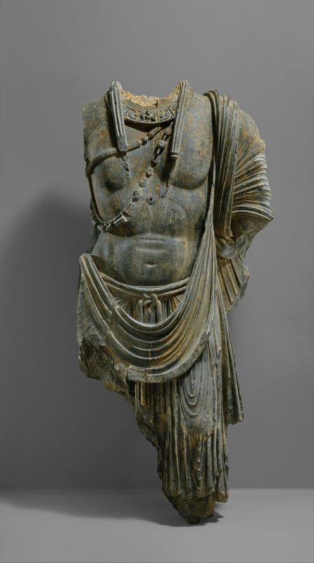 Torso of a bodhisattva statue, found at Seri_Bahlol, schist, ca. 5th c. CE.