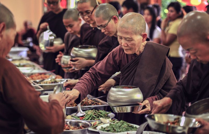 Buddhist monks during a meal.