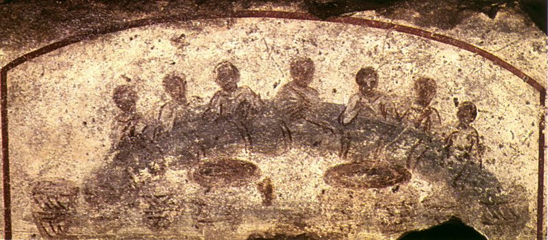 Wall painting, Calixtus Catacomb, 3rd century. The Eucharist was often symbolized by the miraculous multiplication of the loaves.
