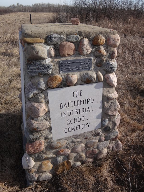 A cairn erected in 1975 marking the Battleford Industrial School cemetery.