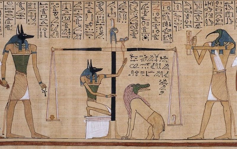 In this ca. 1275 BCE Book of the Dead scene the dead scribe Hunefer's heart is weighed on the scale of Maat against the feather of truth, by the canine-headed Anubis. The ibis-headed Thoth, scribe of the gods, records the result. If his heart is lighter than the feather, Hunefer is allowed to pass into the afterlife. If not, he is eaten by the crocodile-headed Ammit.