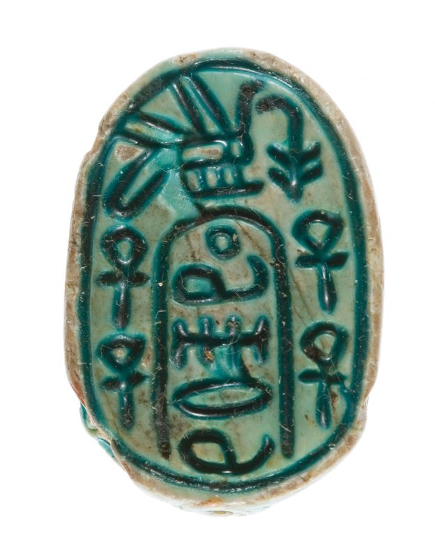 Canaanite Anra scarab showing Egyptian nswt-bjt and ankh symbols bordering a cartouche with an undeciphered sequence of hieroglyphs, c. 1648–1540 BCE.