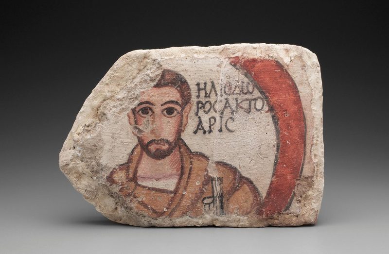 The tile  (c. 200–256 CE) from the ceiling of a House of Scribes.