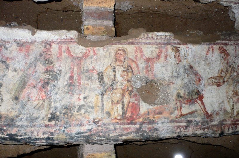 The Three Magi and Mary with child. Wall painting, catacombs of Domitilla, Rome.
