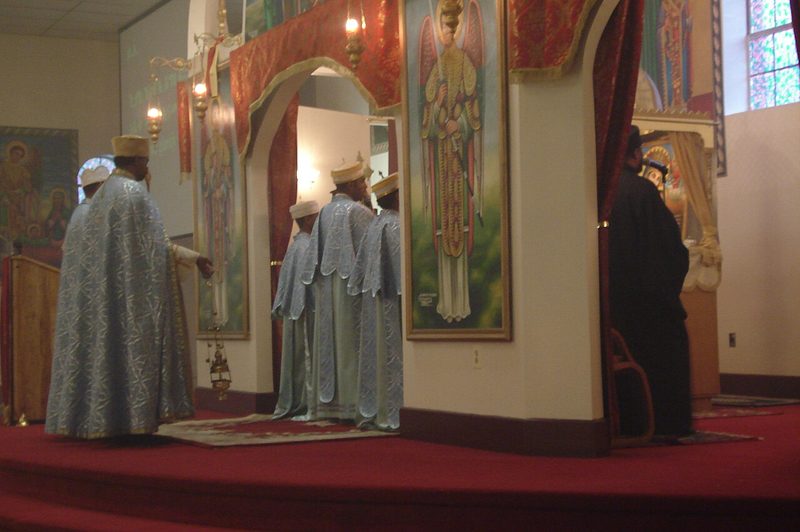 Priests and deacons conducting a church liturgy service at Debre Meheret Kedus Michael Ethiopian Orthodox Cathedral, Washington, DC, USA.