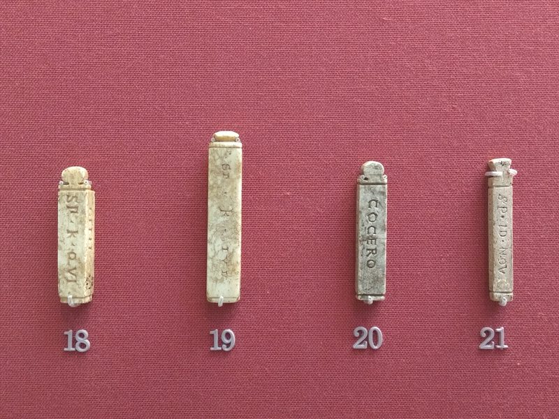 Ivory bankers' tallies used to seal bags of denarii that were checked for weight and purity of silver.