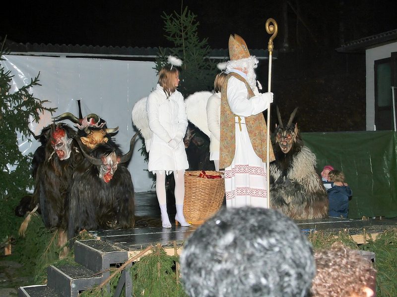 Christmas play: St. Nicholas with his Krampus and angels, Salzburger Land, Austria