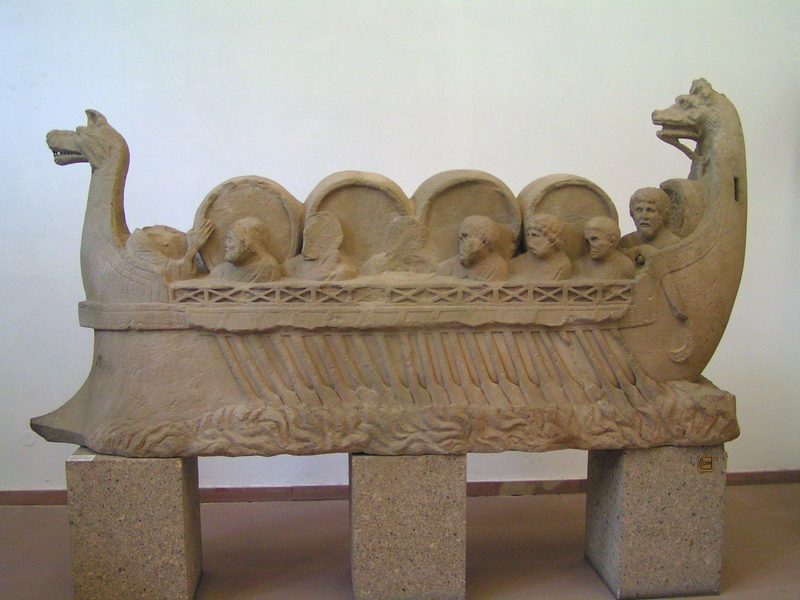 River vessel carrying barrels, assumed to be wine.