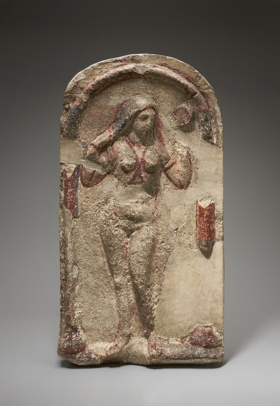 Relief of Aphrodite in a niche.