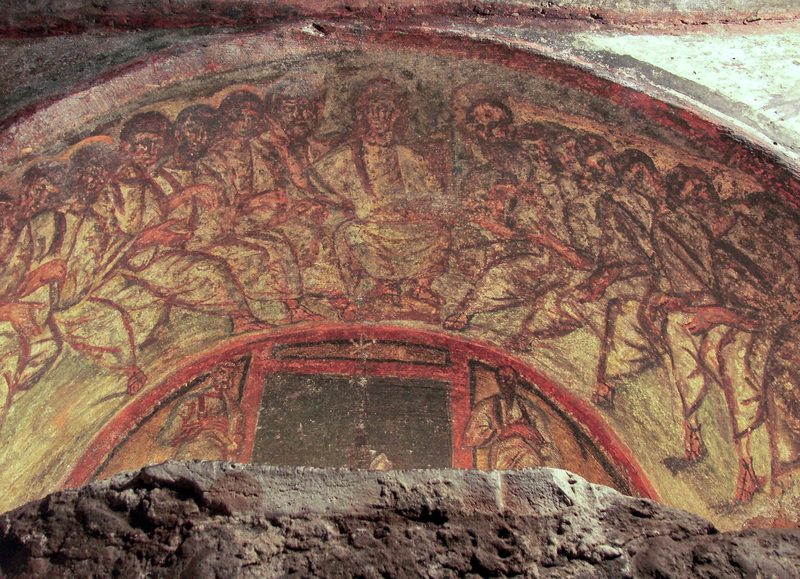 Another wall painting with  Jesus and the twelve apostles, with the Chi-Rho sign. Catacombs of Domitilla, Rome.