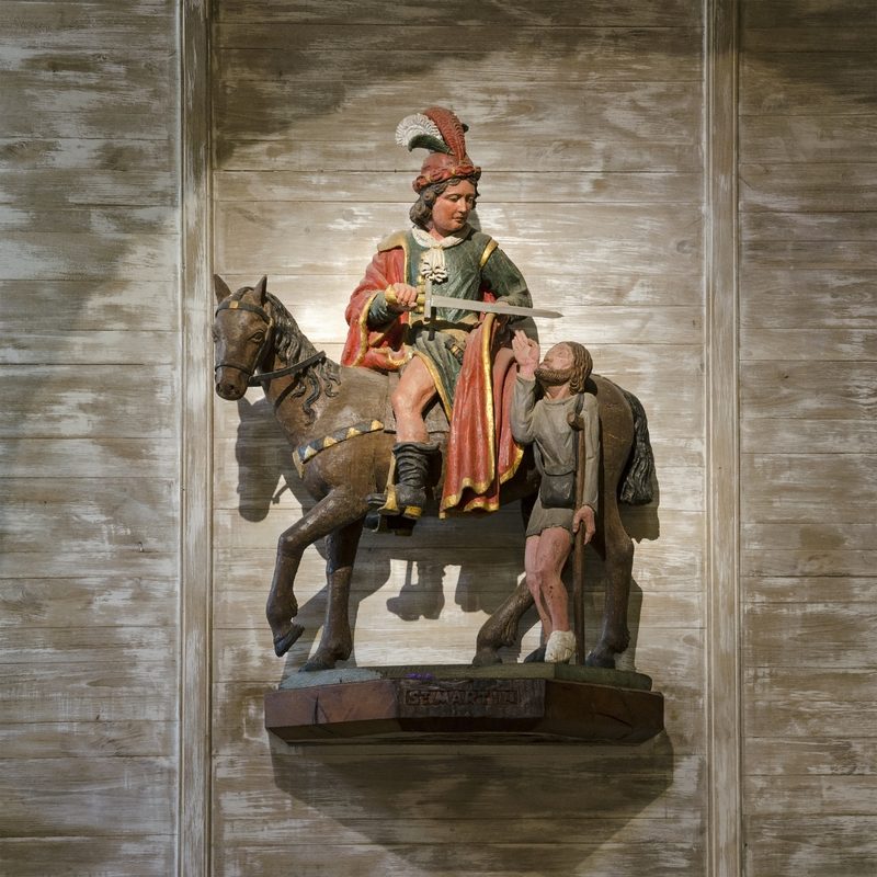 Charity of Saint Martin, polychrome wood, Chapelle Saint-Pierre, Saulges (Mayenne, France).