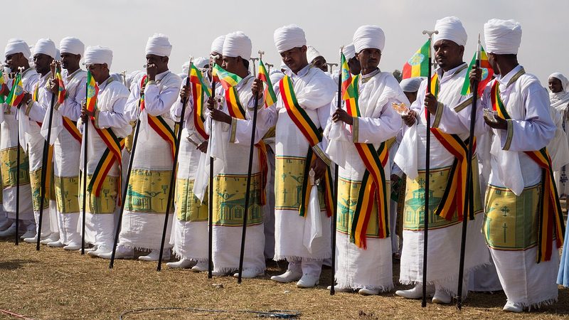 Ethiopian Orthodox priests dancing during 2015 Timkat celebration.