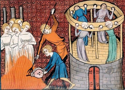 Torturing and execution of witches in medieval miniature, 14th century.