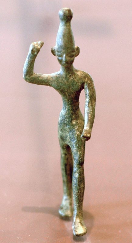 Figure of Ba'al with raised arm, 14th–12th century BCE, found at Ugarit.
