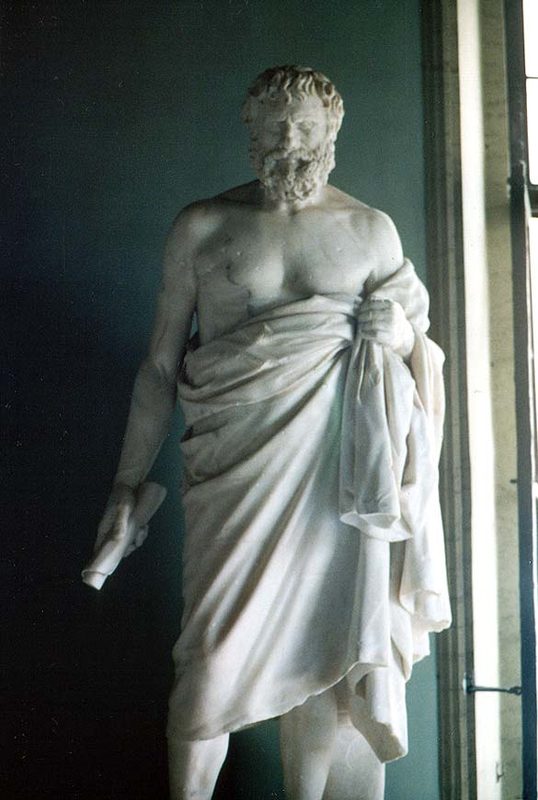 Statue of an unknown Cynic philosopher from the Capitoline Museums in Rome. This statue is a Roman-era copy of an earlier Greek statue from the third century BCE. The scroll in his right hand is an 18th-century restoration.