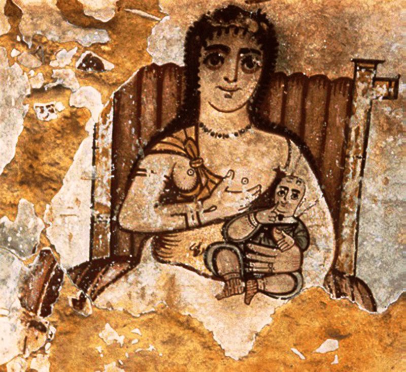 Isis Lactans holding Harpocrates in an Egyptian fresco at Karanis, dating to the 4th century CE.