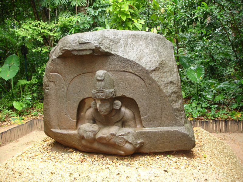 Altar 5 from La Venta. The inert were-jaguar baby held by the central figure is seen by some as an indication of child sacrifice. In contrast, its sides show bas-reliefs of humans holding quite lively were-jaguar babies.