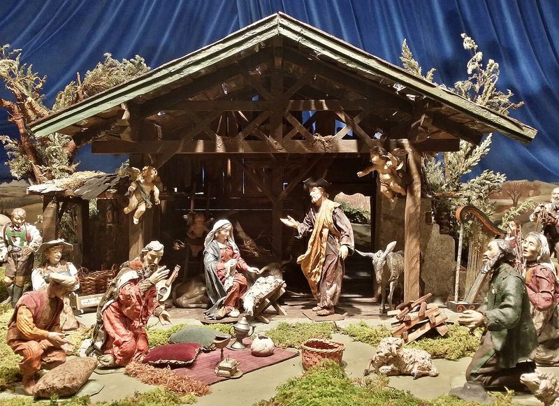 A typical nativity scene, depicting the birth of Jesus in a stable. Munich nativity scene in the inner courtyard of the town hall.