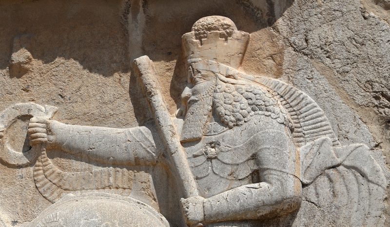 Sassanid-era relief at Naqsh-e Rostam depicting Ahura Mazda presenting the diadem of sovereignty to Ardashir I.