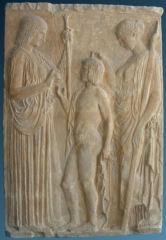 Example of an ancient Greek mystery cult: Triptolemos between Demeter (left), who hands him ears of corn, and Persephone (right), who blesses him. This scene derives from the Eleusinian mysteries, a prominent cult in ancient Greece. Roman copy of votive relief  dating to the Early Imperial period (27 BCE - 14 CE).