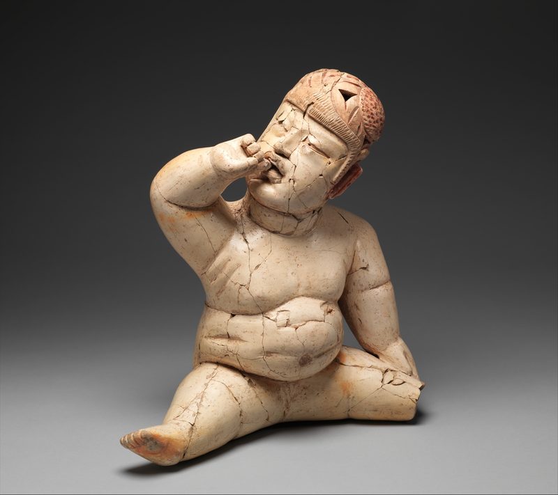 Seated figurine, 12th–9th century BCE, painted ceramic.