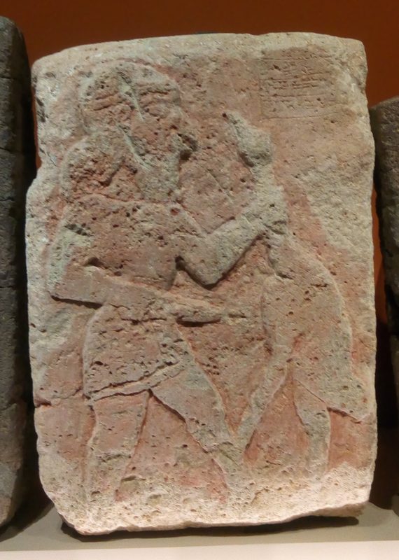 Bas-relief from the palace of Tell Halaf, 9th century BC, showing a man slaughtering a sheep.