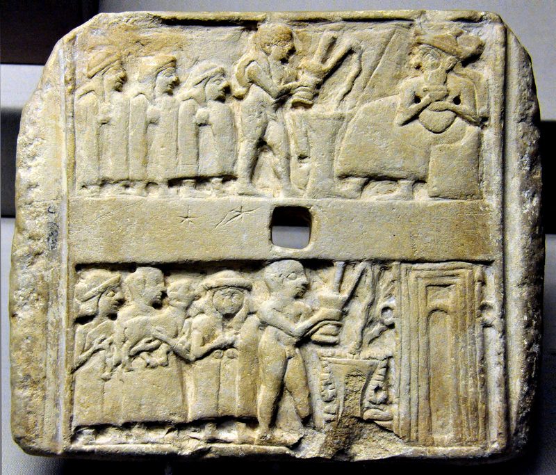 Wall plaque showing libations to a seated god and a temple. Ur, 2500 BCE.