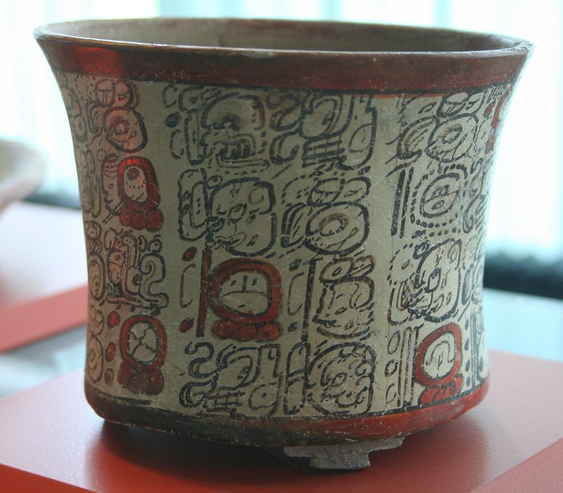 Ceramic vessel painted with Maya script.