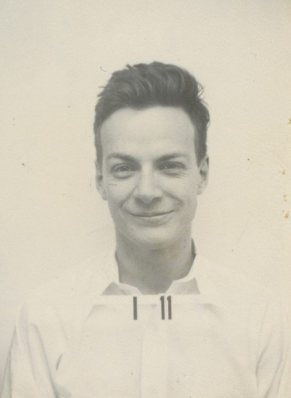 Richard Phillips Feynman (1918–1988), photo from his duty pass during his time at Los Alamos in the 1940s.